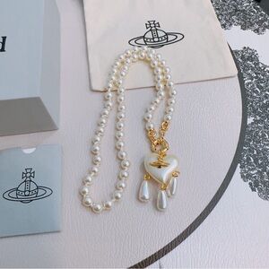 Vivienne Westwood Pearl Necklace with Gold Accents